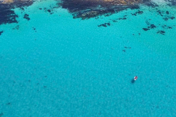 a pool next to a body of water